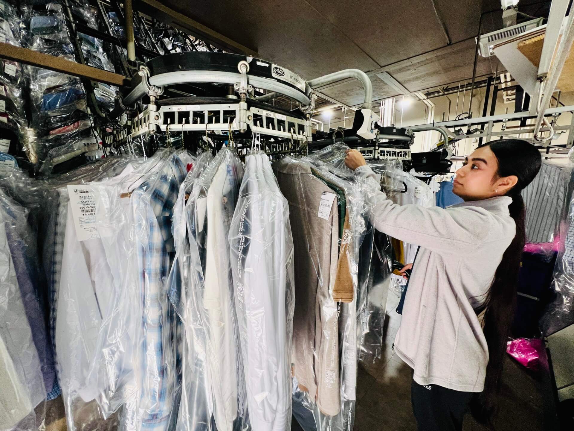 luxe dry cleaning on conveyer